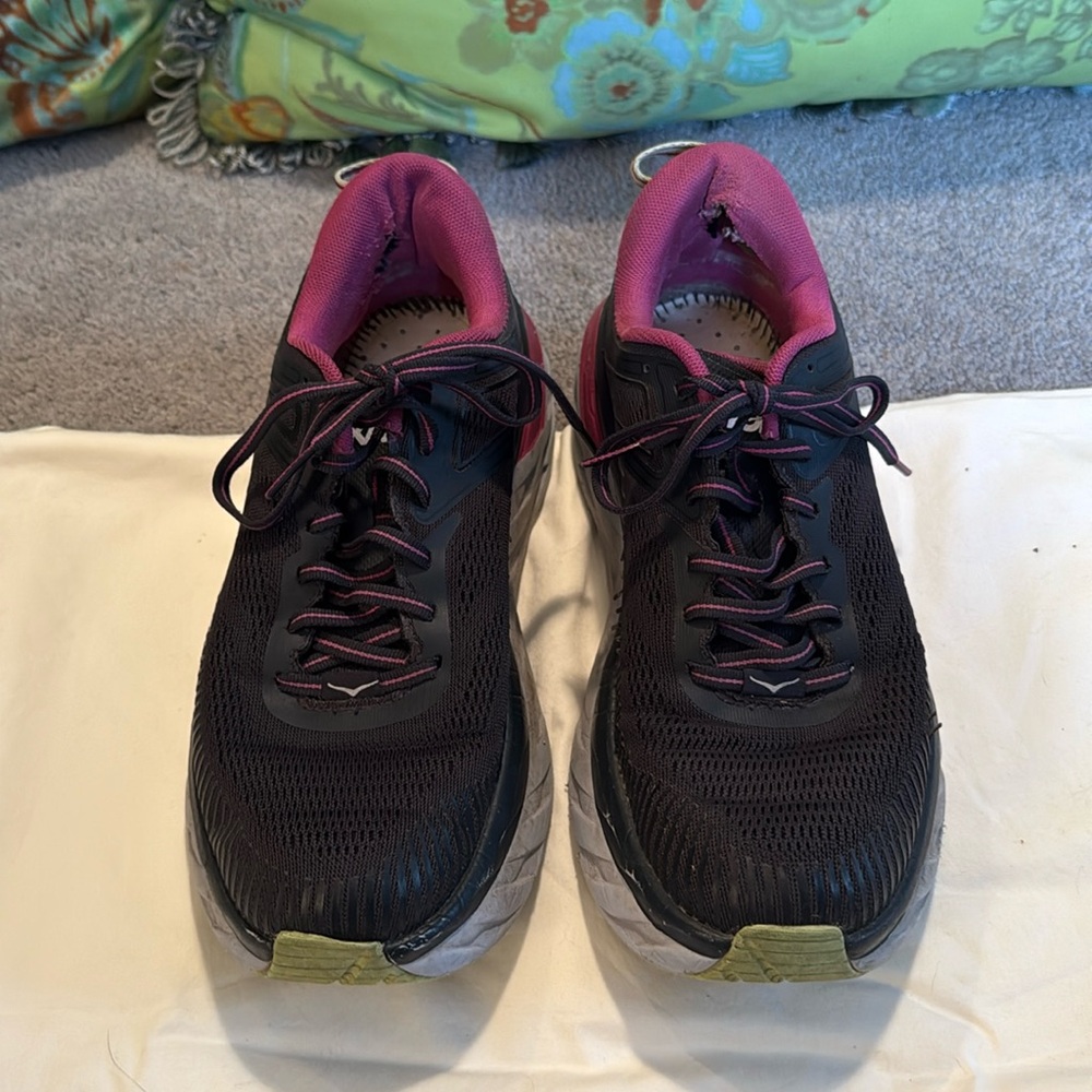 Hoka woman’s athletic shoes size 9. Worn but still have life